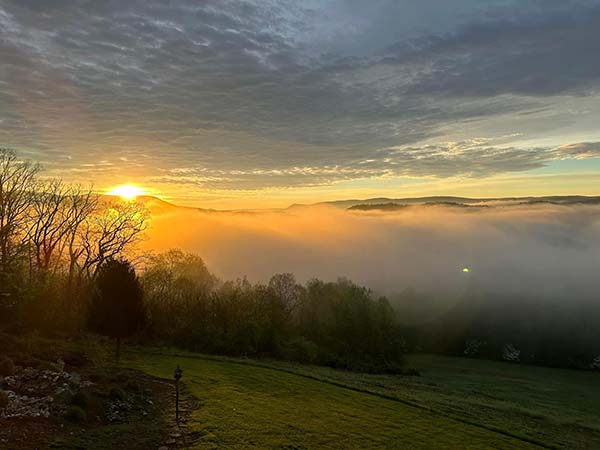 Sunrise view with fog at the Lilly Valley Inn